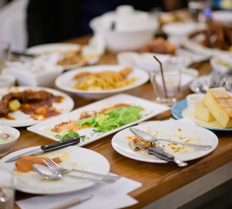 leftover food on the restaurant table