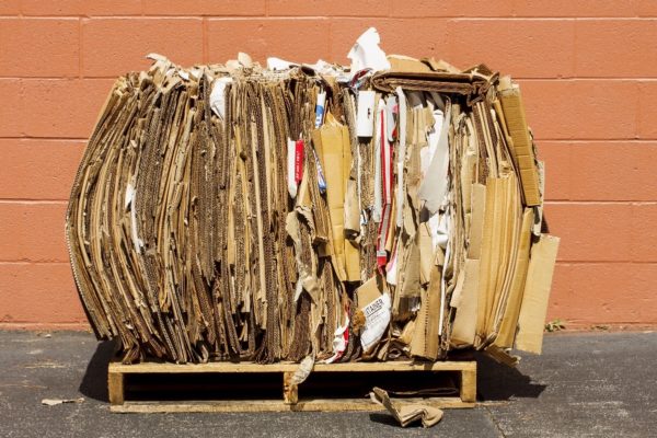 bundle of cardboard crushed and packed for recycling