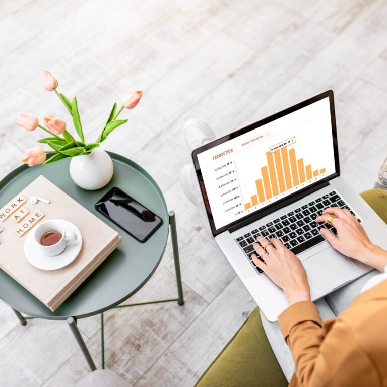 Woman working on computer at home