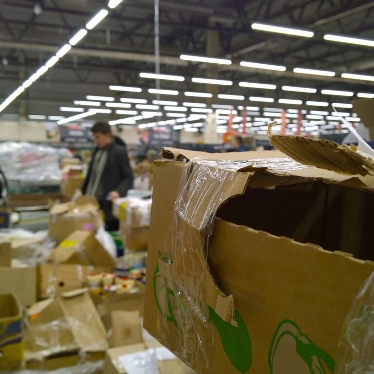 cardboard boxes on dirty floor.